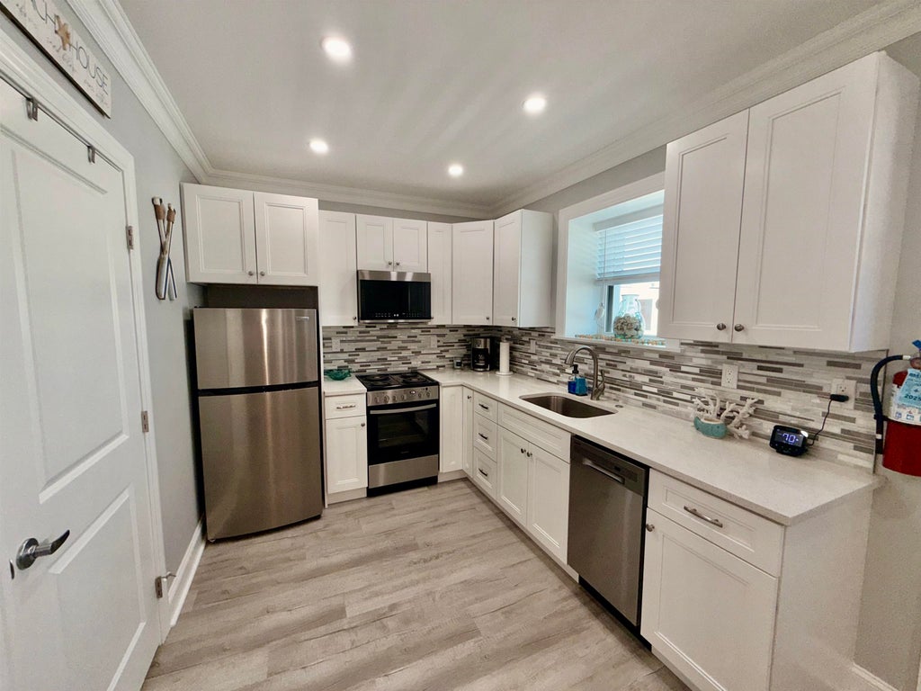 Photo of 204 E Primrose Avenue #102, Wildwood Crest, NJ 08260 (MLS # 261571)