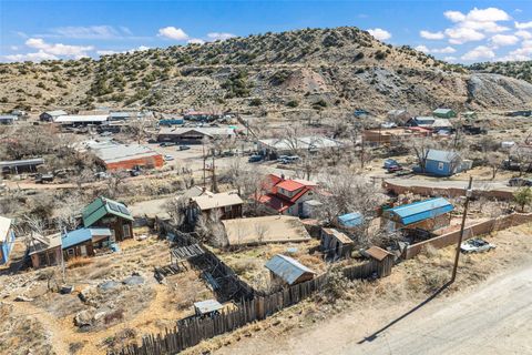 Tiny photo for 1 Opera House Road, Madrid, NM 87010 (MLS # 202600581)