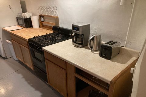 Tiny photo for 1 Opera House Road, Madrid, NM 87010 (MLS # 202600581)