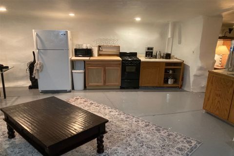 Tiny photo for 1 Opera House Road, Madrid, NM 87010 (MLS # 202600581)