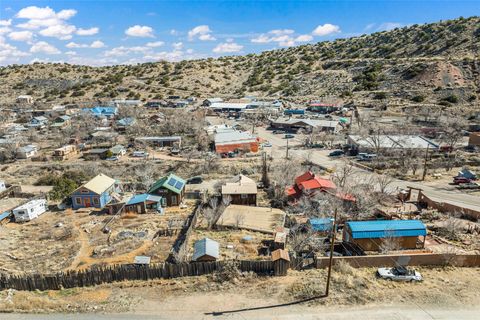 Tiny photo for 1 Opera House Road, Madrid, NM 87010 (MLS # 202600581)