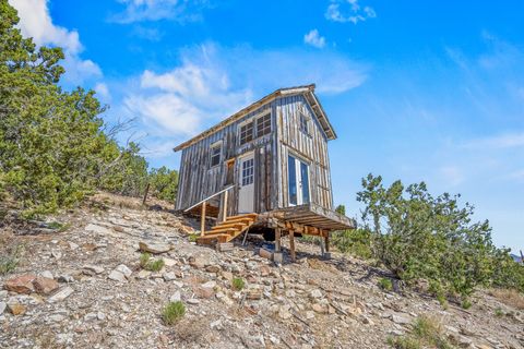 Tiny photo for 6 Harvey Rd, Madrid, NM 87010 (MLS # 202601216)