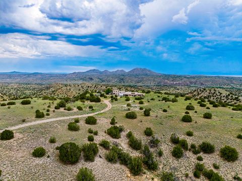 Tiny photo for 115 Waldo Mesa, Madrid, NM 87010 (MLS # 202403116)