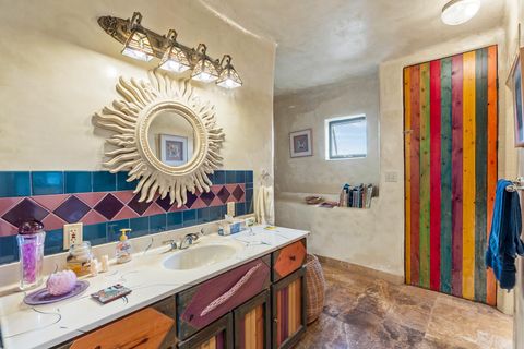 Tiny photo for 115 Waldo Mesa, Madrid, NM 87010 (MLS # 202403116)