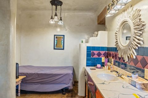 Tiny photo for 115 Waldo Mesa, Madrid, NM 87010 (MLS # 202403116)