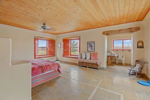 Tiny photo for 115 Waldo Mesa, Madrid, NM 87010 (MLS # 202403116)