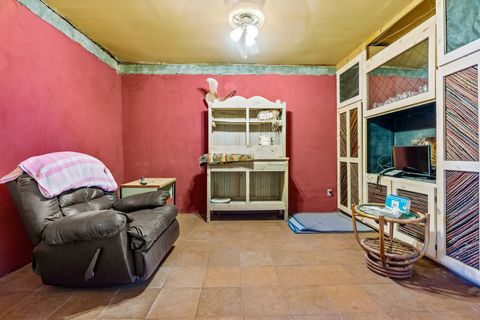 Tiny photo for 115 Waldo Mesa, Madrid, NM 87010 (MLS # 202403116)