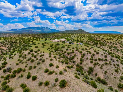 Tiny photo for 115 Waldo Mesa, Madrid, NM 87010 (MLS # 202403116)