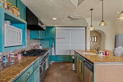 Tiny photo for 115 Waldo Mesa, Madrid, NM 87010 (MLS # 202403116)