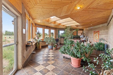 Tiny photo for 115 Waldo Mesa, Madrid, NM 87010 (MLS # 202403116)