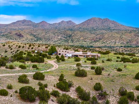 Tiny photo for 115 Waldo Mesa, Madrid, NM 87010 (MLS # 202403116)