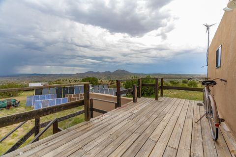 Tiny photo for 115 Waldo Mesa, Madrid, NM 87010 (MLS # 202403116)