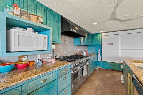 Tiny photo for 115 Waldo Mesa, Madrid, NM 87010 (MLS # 202403116)