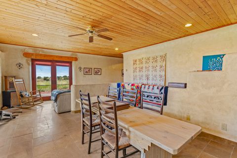 Tiny photo for 115 Waldo Mesa, Madrid, NM 87010 (MLS # 202403116)