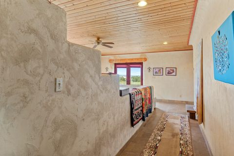 Tiny photo for 115 Waldo Mesa, Madrid, NM 87010 (MLS # 202403116)