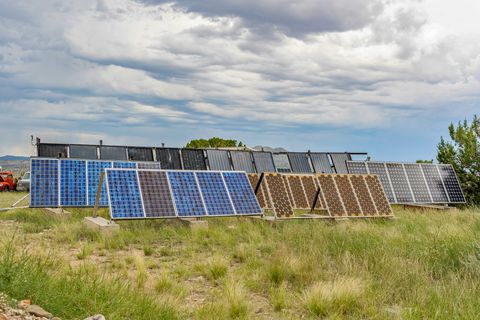 Tiny photo for 115 Waldo Mesa, Madrid, NM 87010 (MLS # 202403116)