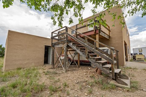 Tiny photo for 115 Waldo Mesa, Madrid, NM 87010 (MLS # 202403116)
