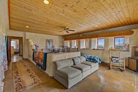 Tiny photo for 115 Waldo Mesa, Madrid, NM 87010 (MLS # 202403116)