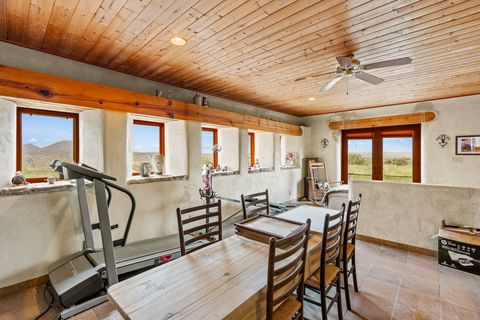 Tiny photo for 115 Waldo Mesa, Madrid, NM 87010 (MLS # 202403116)