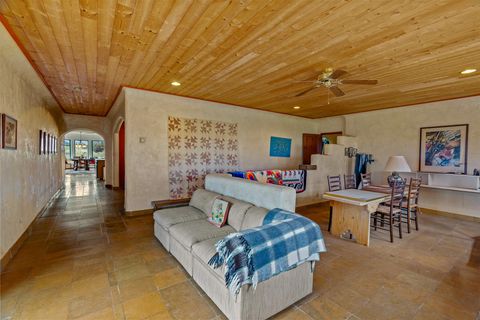 Tiny photo for 115 Waldo Mesa, Madrid, NM 87010 (MLS # 202403116)