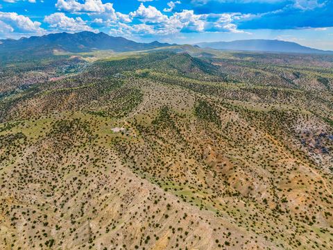 Tiny photo for 115 Waldo Mesa, Madrid, NM 87010 (MLS # 202403116)