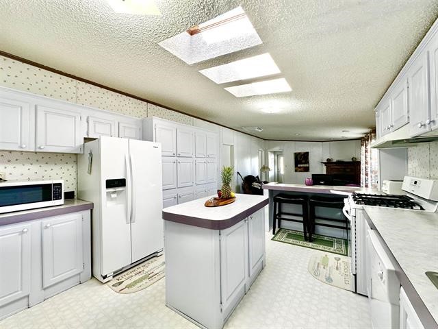 Ojo Sarco, New Mexico 97521, United States, 3 Bedrooms Bedrooms, ,3 BathroomsBathrooms,Residential,Active,68778