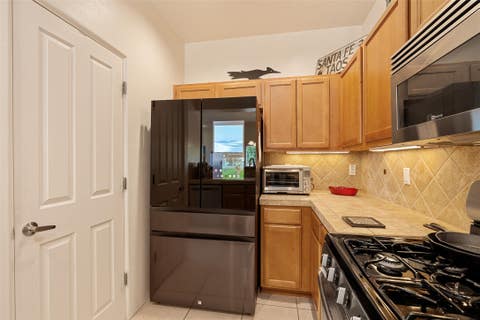Tiny photo for 51 Canada Del Rancho #D, Santa Fe, NM 87508 (MLS # 202603017)
