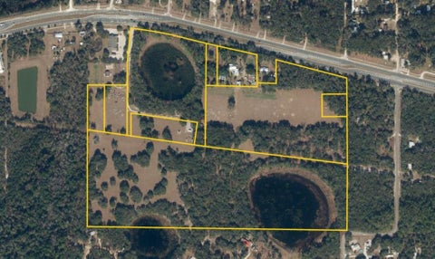 Photo of 1065 State Rd 20, Interlachen, FL 32148 (MLS # 264440)