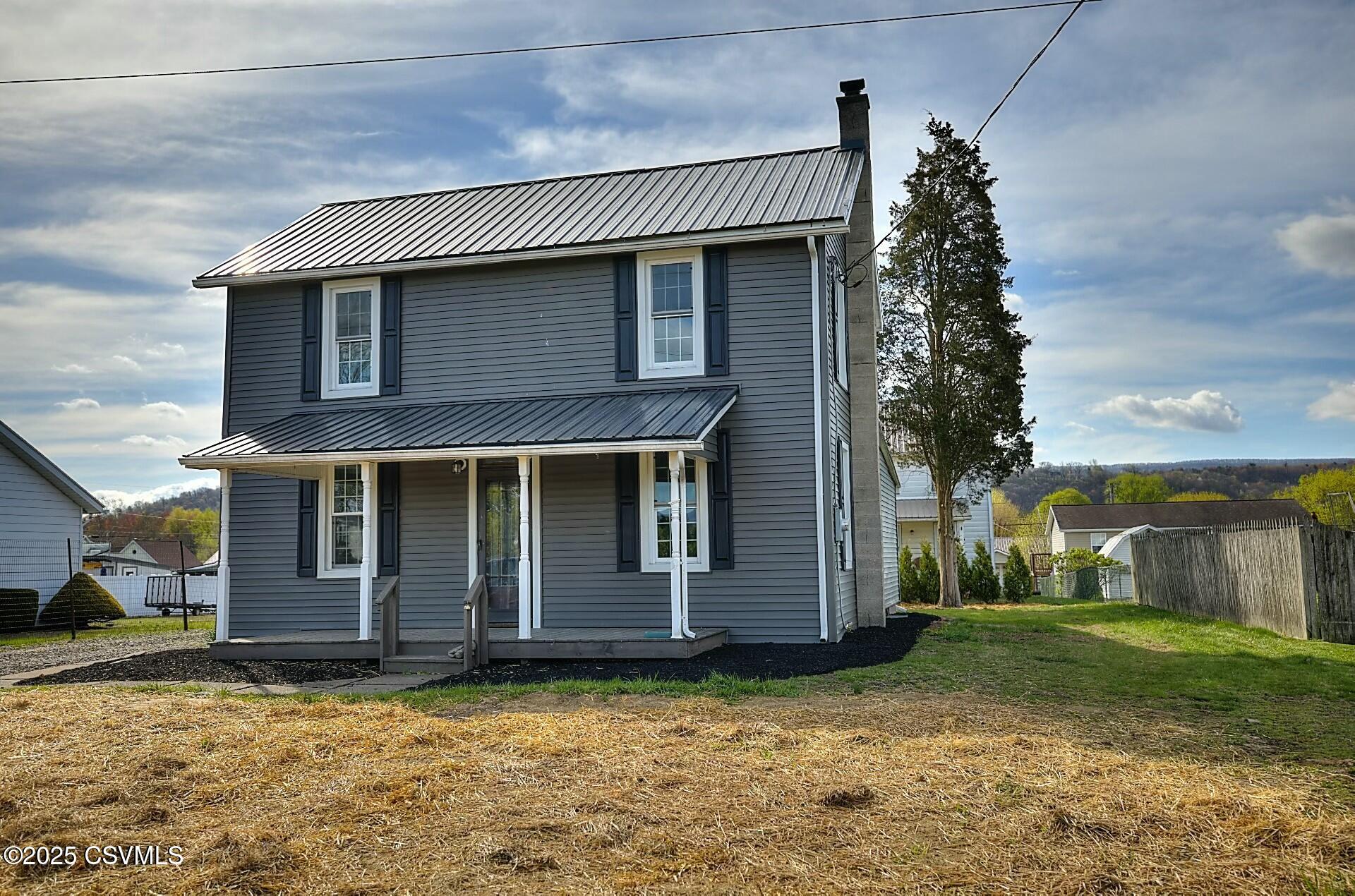 214 E THIRD Street