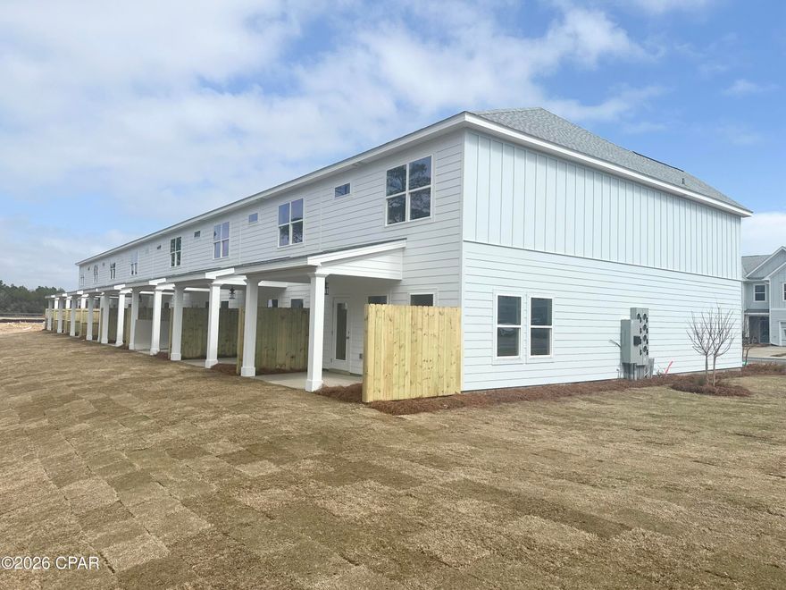 NO RENTAL RESTRICTIONS!!! Our stunning pool is NOW OPEN! The prefect place to SOAK UP THAT Florida SUN! Seagate at Clara is a new townhome community nestled in the vibrant city of Panama City Beach, FL. This two-story unit features board and batten exterior and covered entries. One car garage provides a great space for storing beach essentials. This open concept townhome boasts a stylish kitchen with white cabinets, tile backsplash, a large island with quartz counter tops - perfect for entertaining.  The elegant Owners Suite is designed with comfort in mind showcasing a large walk in closet and double- bowl vanities. Main Bath has tiled shower.  All bathrooms have quartz countertops.  LVP is located throughout the home.  The community pool features a cabana, lounging, seating and grilling stations. This community has a dedicated dog park. Seagate at Clara is in a prime location, approximately 1.4 miles to the sandy beaches and just minutes from Pier Park.