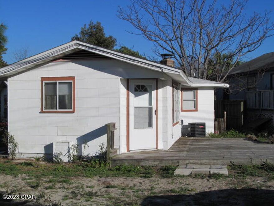 Walk to the beach from this 1 bedroom, 1 bath duplex with small office. Duplex features open living/dining room area, washer/sryer and wooden deck. Water included in rental payment.  Fireplace is non-operational.