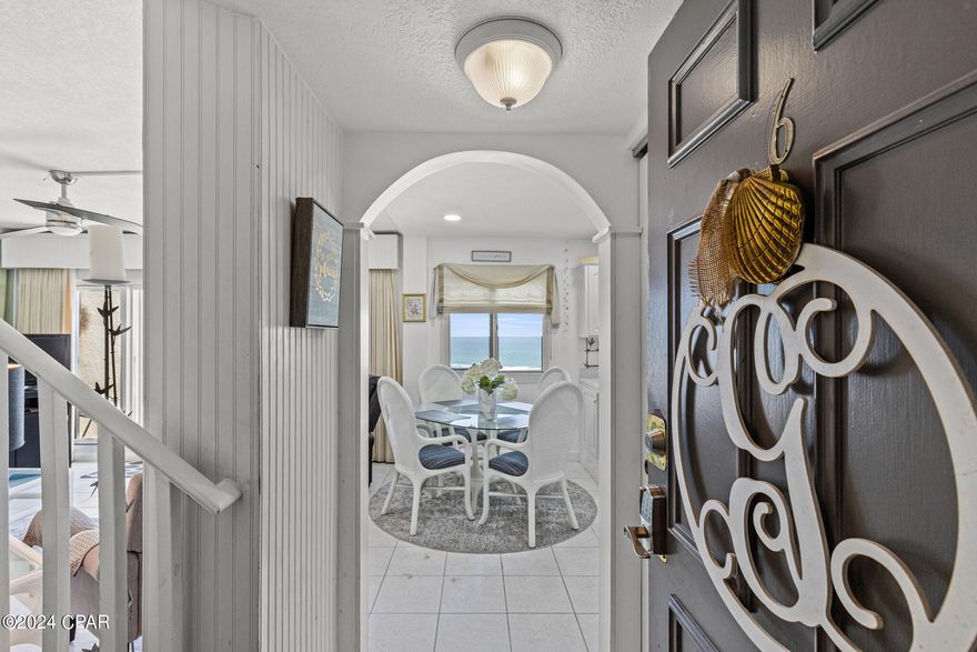 Absolutely the best view from this top floor, end of-the-wing unit!  Breathtaking sunrises and still watch the sun setting in the evening.  Entering the unit, the stairwell has been opened up expanding the view of the Gulf, Carillon Beach and the downstairs portion of the unit.  Unit features an arched foyer, updated kitchen, new stainless steel appliances, solid-surface countertops.  wooden stair treads to second floor.  The second floor features two bedrooms and two baths; the guest bedroom has a wall-to-wall picture window overlooking the Gulf of Mexico; the primary bedroom has an ensuite bath and a balcony overlooking both Lake Powell and Carillon Beach.  Pinnacle Port Resort is situated on a 25+ acre site within a beautiful gated community having over ¼ mile of beach frontage!  The complex has lots of amenities including two swimming pools, tennis courts sauna/steam room, fitness room, its own private freshwater dock with boat slips boat launch and wi-fi.   Please note that the Association fees include electricity for heating, cooling and hot water.  The owner pays a small electricity bill for lighting and appliances only.