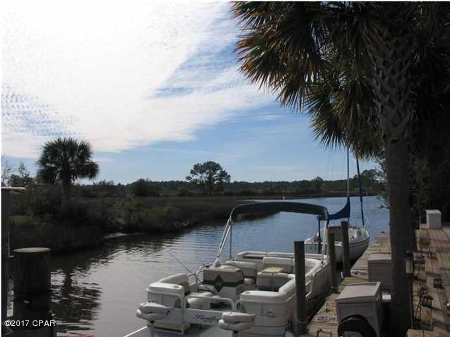 NICE CANAL FRONT TOWNHOUSE WITH 3 BEDROOMS AND 2 BATHROOMS UPSTAIRS AND A HALF BATHROOM DOWNSTAIRS. PROPERTY HAS A GLASS/SCREENED IN FLORIDA ROOM OVERLOOKING THE LARGE PAVED BACK AND CANAL. PLENTY OF BACKYARD FOR A HOTTUB AND HAS A BUILT-IN PIZZA OVEN AS WELL! SINGLE CAR GARAGE AND EXTRA ENCLOSED MASTER BALCONY MAKES THIS A GREAT PROPERTY! THERE IS ALSO A BONUS ROOM OFF OF ONE OF THE BEDROOMS FOR ADDITIONAL STORAGE OR A PLAY ROOM FOR THE KIDS. SELLER WILL PAY UP TO $3000 OF BUYER'S CLOSING COSTS WITH ACCEPTABLE OFFER