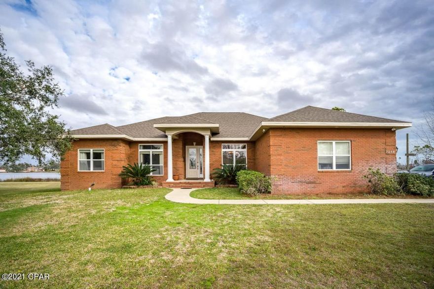 Custom built waterfront home located in Callaway. Living room features an electric fireplace, eat in kitchen with a breakfast bar and an island, formal dining room, laundry room equipped with a washer/dryer connection. Master bedroom en-suite features his and hers walk in closets, garden tub, and a walk in shower. Back deck overlooking the water, and a 2 car garage with plenty of storage space. Well water and septic tank.