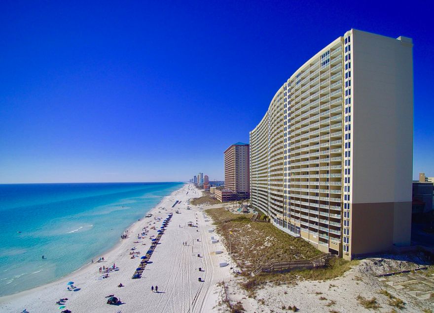 Strong Rental! Gross Income 2019 $31,980. Spacious 1-Bedroom +Bunks, 2 Bathrooms. Gulf-Front balcony with endless beach and sunset views. So much NEW in this unit: Appliances, Bedroom Flooring, Sofa, Loveseat. Carrier 2-ton AC 2017. Sterns & Foster Mattresses. Good floor height, near pool amenities, beach access. Fun upscale resort! Everyone loves the children's pool area with snack bar, game room, activities center. Adults relax at the beachside pool with hot tub & tiki bar. The SkyBar hosts events & parties. Starbucks and Sunsations Shop are onsite. Fitness Center with Day Spa. Attached Garage, street walkover to condos. Close to Pier Park's shopping, dining, entertainment and dog beach. HOA $1803/quarter. Buyer must honor existing bookings - Prepaid rent transfers to buyer at closing.