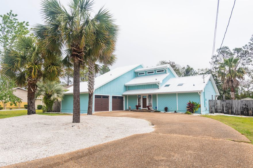 Beautiful home in the popular Colony Club.This house is unique and has it all.Tile floors,open and very functional floor plan,spacious rooms, large kitchen,high ceilings,loft,and more! Roof and HVAC only 2 years old!The master is on the main w/ lots of room and spacious bathroom.Two nice size bedrooms upstairs with a loft area that can be used as an office,family room, or for simply relaxing.The kitchen boats granite counter tops,stainless steel appliances,double oven,and tons of cabinets.The backyard is a haven with an entertaining patio,an additional patio outside master bedroom,and has enough room to put a large pool if desired. Home backs up to Holiday Golf Course and is two miles to Pier Park, beaches, shopping, entertainment,and dining! No HOA's