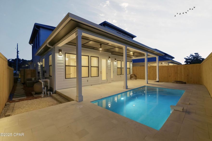 Luxury 2025 New Construction | Walk to Beach | Private Pool | Sleeps 16 | STR Approved

Brand-new 2025 luxury beach home just steps from the sugar-white sands of Panama City Beach. This 4-bedroom, 3.5-bath coastal retreat is designed for both lifestyle and income, comfortably sleeping up to 16 guests and offering outstanding short-term rental potential. Multiple local vacation management companies project up to $160,000 in annual gross rental income.

The flexible floor plan features two main-level suites with private baths--ideal for guests and maximizing rental performance. Inside you'll find durable LVP flooring, soaring accent ceilings, a bright loft for additional sleeping or game space, and an open-concept layout built for entertaining.

The chef's kitchen includes custom cabinetry, quartz countertops, a gas range with designer hood, and a large island perfect for gatherings. Spa-inspired bathrooms and upscale coastal finishes elevate the home's luxury feel.

Step outside to your private saltwater pool and covered patio--an essential amenity for high-performing vacation rentals.

Built with durable 2x6 framing and a metal roof for long-term strength and efficiency. Located in a golf-cart-friendly neighborhood just minutes from Pier Park, Scenic 30A, TopGolf, Dolly Parton's Pirate Voyage, and Camp Helen State Park.

Short-term rentals allowed. Exceptional opportunity for a high-performing vacation rental, second home, or Gulf Coast investment property.