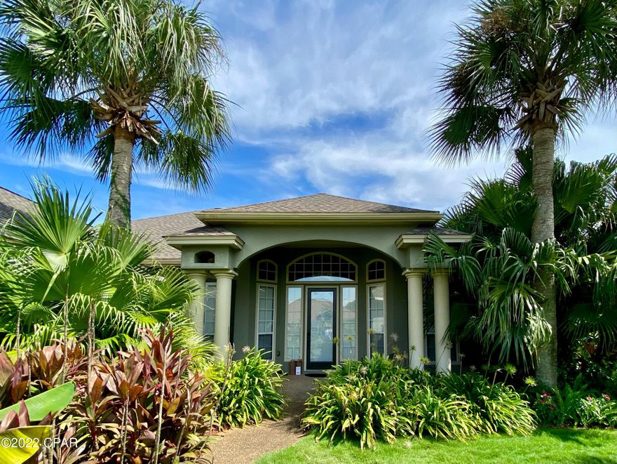 *CURRENTLY UNDER CONTRACT, SELLER WILL CONSIDER BACKUP OFFERS* Best deal on a beautiful POOL HOME, 5 minutes from the BEACH! 3 bedrooms, 2 baths, BONUS ROOM & heated/cooled garage. Open floor plan, high ceilings, huge windows, wood floors throughout, gas fireplace & stove, renovated bathrooms. Very private back yard, custom pool with travertine stone patio. Zoysia grass, fruit trees & exotic plants. Solar panels save hundreds of dollars every year on electric bills! Home includes a greenhouse, geothermal H20 heater & storage shed. 5 min to restaurants, entertainment, activities, St. Andrews State Park & the Gulf of Mexico! SO MUCH VALUE in this home! All information is approximate and should be verified by buyer if important.