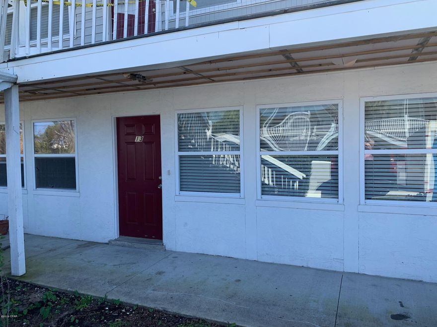 St. Andrew's Condo - Located at St. Andrew's Harbour Condo, this is a well done 1 bedroom 1 bath ground floor condo with galley style kitchen, stack-able washer and dryer, and community pool.  Water, sewer, trash and basic cable are included.