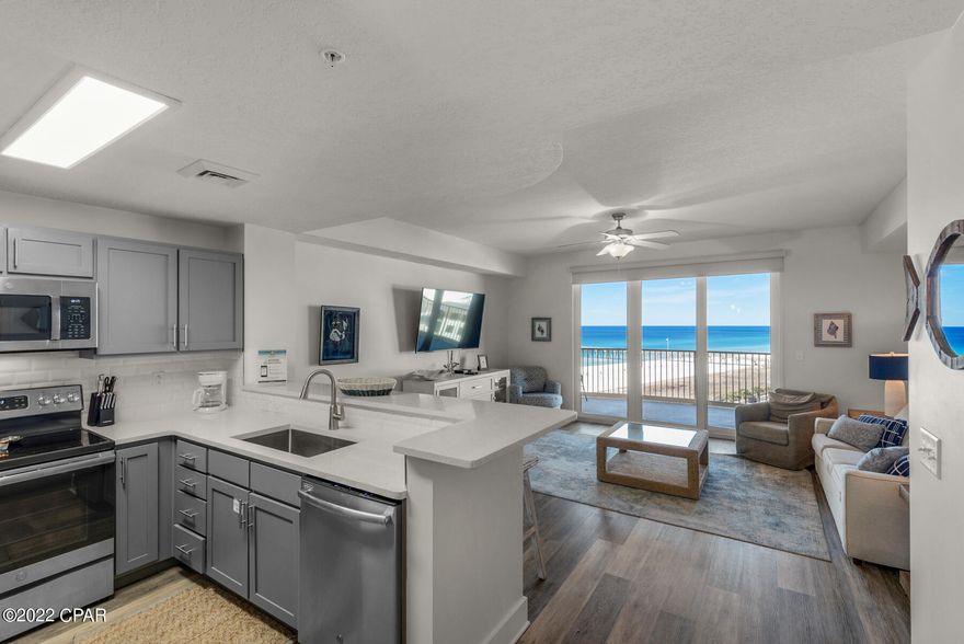 Stunning 1 Bedroom 2 bath condo with Built-In Bunks. Professionally decorated with an abundance of upgrades including: Shiplap wainscoting in the hall/foyer, Bead-board in both bathrooms, Shiplap accent wall in Master bedroom and Living room, and Custom, built-in bunks in the hall. This unit also comes with quartz countertops, GE appliances, luxury vinyl plank flooring, ceramic tile in laundry room and bathrooms, and cultured marble in showers. This unit sleeps 6 comfortably with the queen sleeper sofa in the living room. Unbelievable location next to Pier Park with unobstructed views of the Gulf of Mexico. Calypso Resort offers a gorgeous pool that is heated in the cold months, hot tub, fire pit, synthetic turf, 2 tiki hut/bars, 9 rentable cabanas, and an on-site restaurant!