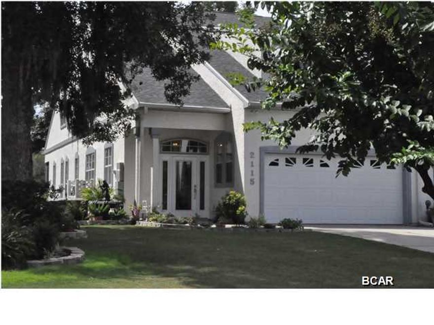 ENJOY THE GOLF COURSE FROM YOUR BACKYARD AND NORTH BAY FROM THE FRONT! THIS LOVELY, END-UNIT TOWN HOME IN PANAMA COUNTRY CLUB FEATURES 3,141 SQUARE FEET OF LIVING SPACE WITH 4 BEDROOMS (TWO MASTERS), 3 1/2 BATHS, A STUDY AND A BONUS ROOM EQUIPPED FOR MEDIA. IMMACULATE AND COMPLETELY UPDATED WITH GRANITE COUNTERTOPS, TILE AND STAINLESS APPLIANCES IN THE KITCHEN, HARDWOOD IN THE DINING AND LIVING AREAS, NEW CARPET IN THE BEDROOMS, FRESHLY PAINTED INSIDE AND OUT, AND A BRAND NEW ROOF! LARGE WINDOWS TO ENJOY VIEW OF THE GOLF COURSE, A SCREENED IN PORCH, TWO CAR GARAGE WITH ROOM FOR AN EXTRA FRIDGE AND GOLF CART, PLUS EXTENSIVE STORAGE THROUGHOUT. WHOLE HOUSE GENERATOR INSTALLED JUNE 2013, A 2 1/2 TON AC AND GAS FURNACE WAS INSTALLED SEPTEMBER 2012 AND NEW ROOF IS FROM JULY 2014. THE