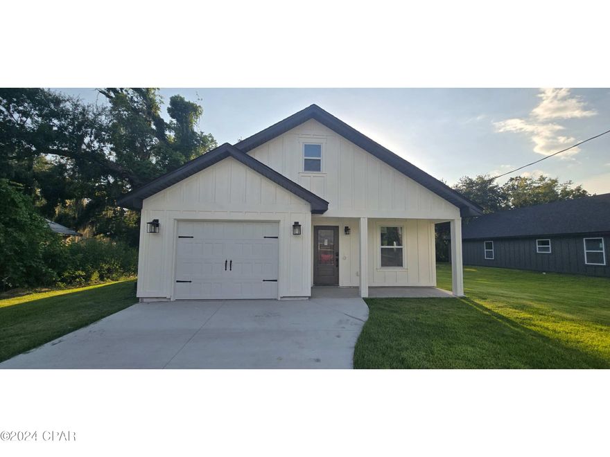 Putting the finishing touches on this beautiful, rare new construction home in the heart of St Andrews. Just minutes from the shopping and restaurants in the heart of St Andrews. 500 feet from Lake Huntington Park and boat ramp. Launch your boat and head to the Shell Island, fish from the park shore, or enjoy the park swings and catch an amazing sunset. Home consists of Hardie board and batton siding, full spray foam insulation, stainless steel appliances, LVP flooring throughout, cast iron tubs with large tile shower walls to the ceiling, recessed LED lights throughout, quartz counters and backsplash, and Nest doorbell camera, thermostat, and smoke detectors.