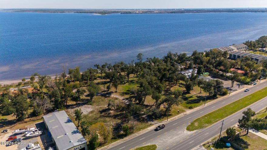 2.2 +/- acre vacant land at 6021 Hwy 98 Bus E (a/k/a Tyndall Parkway), Panama City, FL for sale. The site has a land use classification of Mixed Use - 1 (City of Parker). The property is Hwy 98 road frontage located near the north side of the DuPont Bridge on the approach to Tyndall Air Force Base. Ideal for a variety of development potentials.