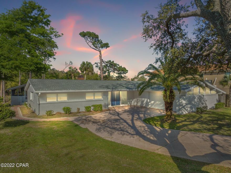 Ideal location on East end of Panama City Beach ~ Park your boat right behind your house after fishing or a day at the island. About 80 feet on the canal and a short boat ride to The Gulf of Mexico. Great 3 bdrm, 2 bath brick home- newly painted. Stainless steel appliances, fireplace, new light fixtures, updated bathrooms, and much more.