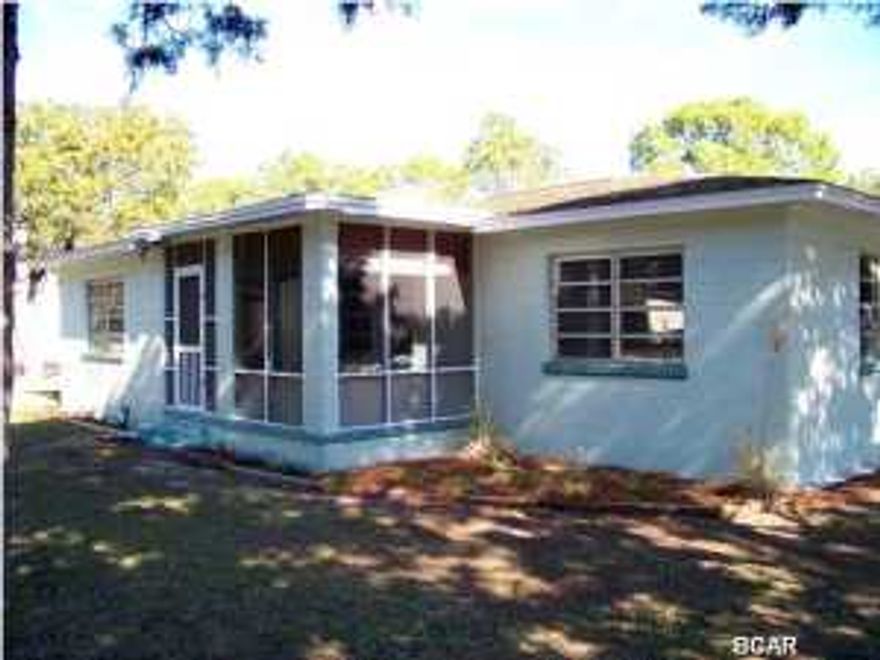 Walk to the beach from this delightful three bedroom, two bath, Florida Cottage. This home has recently been updated with new roof, gorgeous back splash in the kitchen and new flooring. Enjoy your morning coffee or the cool summer breezes on the fully screened front porch. There is ample outdoor storage for your beach and water toys. This shaded corner property sits on two fenced lots just a few steps off Stunning Port St Joe Beach. Enjoy days in the surf and sand and walk home to enjoy quiet evenings on your screened porch and speak with neighbors as they walk by or simply sit and listen to the sounds of the Gulf...it's that close! The 41x12 breezeway could be enclosed for additional outdoor enjoyment. The possibilities are endless. There is room for gatherings large or small both