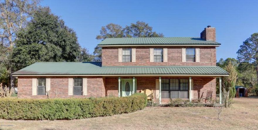 THIS PLACE OFFERS A LITTLE BIT OF EVERYTHING////// IT IS A 2 STORY HOME ON 2 ACRES THAT IS COMPLETELY FENCED! HAS A NEWER 32X48 POLE BARN TO STORE....BOATS/MOTOR HOMES/TOYS//ALSO HAS A 7 STALL HORSE BARN WITH A TACK ROOM!!! YOU WILL LOVE ALL THE MODERN TOUCHES IN THE HOME! ALL WOOD AND TILE FLOORS FOR LOW Maintenance! EVEN THE OUTSIDE OF THE HOME IS LOW MAINTENANCE WITH A METAL ROOF AND BEING ALL BRICK!!!! THIS HOME HAS BEEN VERY WELL TAKEN CARE OF AND UPDATED  APPLIANCES. YOU CAN ENJOY A WOOD BURNING FIREPLACE IN TWO DIFFERENT AREAS OF THIS HOME. THE LIVING ROOM AND THE MASTER BEDROOM!!! ALL SIZES ARE APPROX. PLEASE VERIFY!!