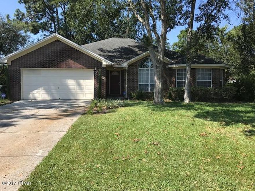 Gorgeous and spacious 3/2 Lynn Haven Home, split floor plan, eat in kitchen and separate formal dining room, family room, wood burning fireplace, built in's, Florida room (can be used as an office), deck, large yard, 2 car garage with room to park 4 cars in front, tile and laminate flooring throughout, Jacuzzi tub in master bathroom, Large walk in closet, laundry inside

This home won't last long.