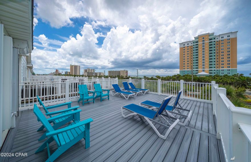 Just Steps from the Beach! This property is across Thomas Drive from Rick Seltzer Park, one of the nicest public beach accesses in Panama City beach.  Enjoy 170 feet of dedicated, pristine beaches with emerald waters.  This park has 1 of only 3 lifeguard stands on the beach, public showers, and tons of excess parking.  This is just out your front door and across the street.  Having the park there also avails this home to special water views!    Turnkey Investment Opportunity or Dream Beach Getaway - Fully Furnished with Breathtaking Gulf Views! Welcome to your slice of paradise! This magnificent 3-bedroom, 3.5-bath, 2,375 sq ft coastal retreat is the ultimate blend of style, comfort, and income potential. With over $50,000 in upgrades completed in the past couple years, including brand-new composite decking and a new roof section beneath it, this home is 100% move-in ready. Whether you're looking for a personal vacation oasis, full-time beachside living, or a high-performing Airbnb investment, this property checks every box. Rental Income Potential: This home generated over $100,000 in rental income in 2021 and 2022 under the previous owner. The current owners use it primarily for personal use, but the earning potential remains strong in this prime location. Highlights You'll Love: • Sold fully furnished - ready to rent or enjoy immediately • Direct Gulf views from multiple levels and a massive 25' x 18' rooftop observation deck • Heated saltwater pool in a private fenced backyard - perfect for entertaining year-round • Spacious living room with 10' ceilings, tile floors, crown molding, fireplace, and abundant natural light • Gourmet kitchen with stainless-steel appliances, granite countertops, wood cabinetry, breakfast bar, and walk-in pantry • Second-floor loft with built-ins, additional suite, and large bedroom with luxury en suite (jetted tub, walk-in shower, dual sinks) • Third-floor entertainment suite with vaulted ceilings, wet bar, sleeper sofa, and custom-built Queen bunkbeds (USB ports & marine lighting) Additional Features: • Sleeps 18-20 guests comfortably • Parking for at least 4 vehicles • Laundry room with washer and dryer • Navien gas tankless water heater • Wi-Fi-controlled Circupool salt generator • Hayward 2500 pool heater and sand filter • Aluminum hurricane shutters for added peace of mind Don't miss this rare opportunity to own a fully upgraded beach home in one of the most desirable locations on the Gulf Coast. Schedule your private showing today and experience the ultimate in coastal living and investment potential.