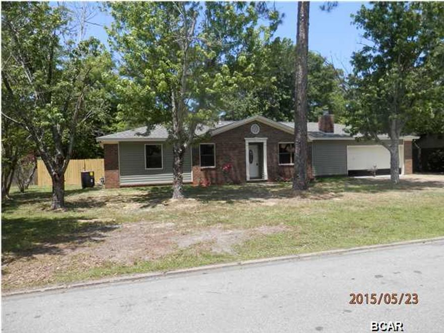 Newly renovated home. Tile throughout with new carpet in the bedrooms. Nice great room with corner brick wood burning fireplace. Dining are and newly remodeled kitchen with new cabinets, counter tops and appliances. Very large laundry room just off the kitchen as well as a 2nd master bedroom with private bath and walk in closet, this room also has access to the screened back porch. At the other side of the home you have 3 additional bedrooms and a hall bath, 1 additional bedroom is the 2nd master with private bath. This home has a new roof as well as A/C unit. Bathrooms have new vanities and fixtures. Freshly painted interior and exterior paint, landscaped and privacy fenced back yard. This home is located just a few blocks to the Venetian Sunset Park, enjoy wonderful sunsets of St Andrew Bay. Call today for an appt. Seller is offering up to $3000 closing cost assistance with acceptable offer.