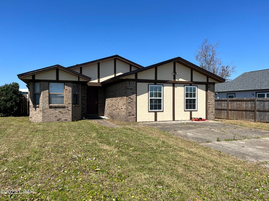 Brick home located in a convenient neighborhood in Callaway, close to Tyndall Air Force base, shopping, restaurants, schools, boat ramps, and area beaches. Needs some love to bring it to its full potential.  Open concept living and dining area featuring a bay window for plenty of natural light. An eat in kitchen features plenty of cabinet space as well as a pantry. There is a 20x20 ''bonus'' room for a playroom, den, or an extra living area. This home features 3 bedrooms with walk-in closets in each bedroom and 2 full baths. Home is in need of some minor repairs. New roof and some new windows after Hurricane Michael. 

All sizes and measurements are approximate; please verify if important!